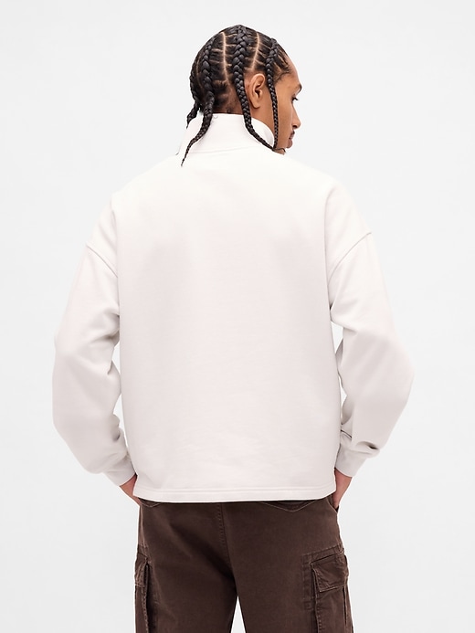pull-over oversize à demi-zip avec logo épais