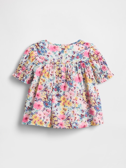 haut fleuri à smocks pour bébé et tout-petit