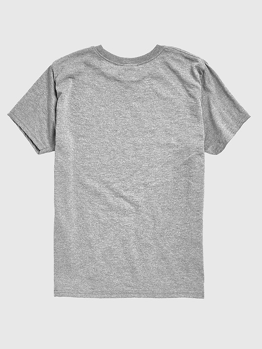 t-shirt graphique à manches courtes pour tout-petits peanuts snoopy faisant de la luge